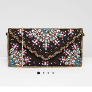 Embellished park lane clutch, never worn